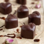 Delicious and decadent raw vegan chocolate candy recipe with a boost of superfoods. You simply need to melt, mix and mould!