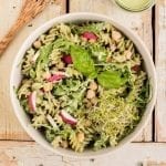 Super easy vegan basil cashew pesto pasta recipe that only requires 10 minutes of your time.