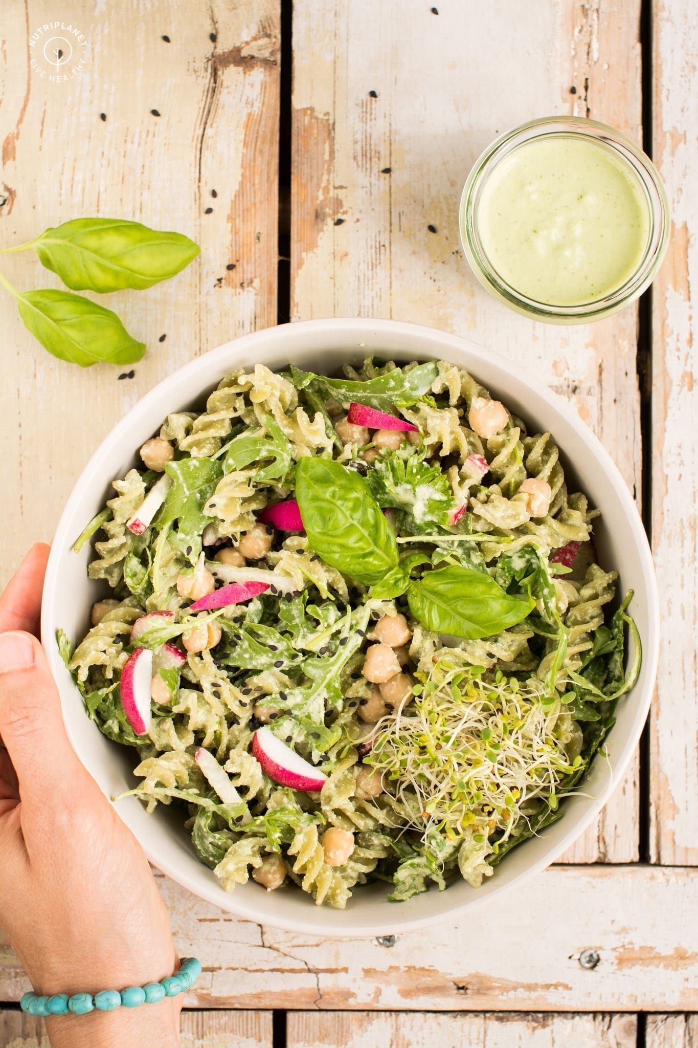 Super easy vegan basil cashew pesto pasta recipe that only requires 10 minutes of your time. 