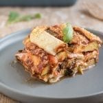Superbly flavourful vegan tomato zucchini casserole with mozzarella that is oil-free and gluten-free. Excellent Mediterranean vegan recipe for side dish or main meal.