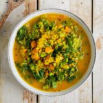 Learn how to make a vegan low glycemic curried red lentil soup with mung beans and kale. It’s a perfectly healthy quick and easy single serving meal to prepare for lunch.